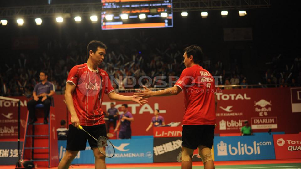 Mohammad Ahsan/Hendra Setiawan susah payah ke babak ketiga setelah dipaksa wakil Prancis Baptiste Careme/Ronan Labar bermain tiga set.